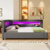 A modern bedroom with a gray upholstered bed featuring purple LED lighting. Anteprima dell’immagine prodotto