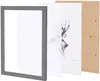 An exploded view of a picture frame with its components laid out. Produktbild-Vorschau