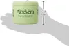 A hand is holding a jar of Aloe Vera body cream. Náhled obrázku produktu