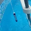 A thermometer floating in a swimming pool. Anteprima dell’immagine prodotto