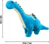 A blue plush dinosaur toy with green spikes along its back and tail, shown from a side-diagonal angle against a white background. Dimensions are indicated with measurement lines and text. Náhľad obrázku produktu