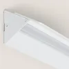 Close-up of a white LED light fixture mounted on a wall. Produktbild-Vorschau