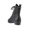 A black boot with a plaid shaft detail. Voir les images du produit