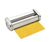 A pasta cutter attachment for a pasta machine, with yellow pasta strands emerging from it. Náhled obrázku produktu