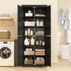 A black storage cabinet with its doors open, displaying various bathroom or laundry items on its shelves. A washing machine is visible to the left. Voir les images du produit