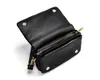 An open black handbag shown from a top-down diagonal angle against a white background. Produktbild-Vorschau
