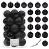 A collection of black Christmas ornaments in a clear plastic container, with additional ornaments displayed to the right. Náhľad obrázku produktu