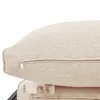 A close-up view of a beige cushion with a zipper. Produktbild-Vorschau