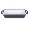 A rectangular cast iron baking dish with a white enamel interior and black exterior, shown from a slightly elevated front view on a white background. Produktbild-Vorschau