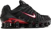 A side view of a black Nike Shox TL sneaker with red accents. Produktbild-Vorschau