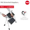 A person is shown folding a step stool, with text and a close-up detail of the stool's locking mechanism. Anteprima dell’immagine prodotto