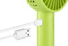 Eine Nahaufnahme zeigt den Unold Handventilator Breezy II beim Laden über USB; der Stecker befindet  Anteprima dell’immagine prodotto