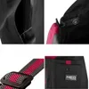 Collage of close-up images showing details of black workwear with red accents. Produktbild-Vorschau