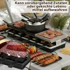 A raclette grill set up on a table with food being cooked. Náhľad obrázku produktu