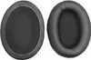 Two black ear pads for headphones are shown against a white background. Produktbild-Vorschau
