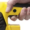 A close-up shot of a hand holding a yellow power tool. Produktbild-Vorschau