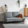 A living room scene featuring a gray sofa, a floor lamp, a painting, and a wooden cabinet. Voir les images du produit