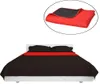 A bed with red and black bedding, and a close-up of a folded red and black blanket. Náhľad obrázku produktu