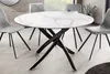 A round dining table with a marble-effect top and a black metal base, surrounded by four grey chairs in a modern dining room setting. Produktbild-Vorschau