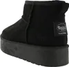 A black Dockers by Gerli boot with a platform sole, shown from the side. Produktbild-Vorschau