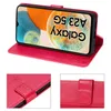 A collage of images showing a red flip case for a Samsung Galaxy A23 5G phone. The main image shows the phone inside the case, propped open. Two smaller inset images show close-ups of the case's details, including the embossed butterfly design and the magn Produktbild-Vorschau