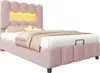 A pink upholstered bed with a yellow LED light strip in the headboard, shown against a white background. Produktbild-Vorschau