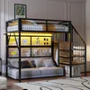 A loft bed with a sofa underneath, a desk area with a wire grid for display, and stairs leading up to the bed. Produktbild-Vorschau
