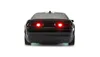 Rear view of a black remote-controlled car with red taillights and green underglow. Náhled obrázku produktu