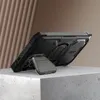 A black phone case with a kickstand is displayed on a concrete block, with a textured brown background. Produktbild-Vorschau