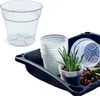 A collection of plastic plant pots and a planting tray. Produktbild-Vorschau