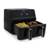 A black dual-chamber air fryer with french fries in one chamber and chicken in the other. Voir les images du produit