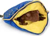 A brown plush frog peeking out of a blue and yellow sleeping bag. Podgląd zdjęcia produktu