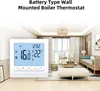 A thermostat is displayed in a modern living room setting. Náhľad obrázku produktu