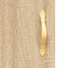 A close-up of a wooden cabinet door with a decorative handle. Podgląd zdjęcia produktu