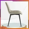 A side view of a modern upholstered dining chair with black legs, presented on a circular platform with a gradient background. Anteprima dell’immagine prodotto