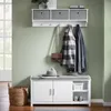 An entryway with a shoe bench, coat rack, and storage shelf. Náhľad obrázku produktu
