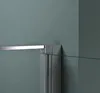 Close-up of a shower enclosure corner with a metal handle and glass panel. Produktbild-Vorschau