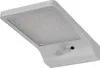 A close-up, angled view of a white LED solar outdoor light with a motion sensor. Voir les images du produit