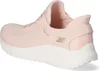 A side view of a pink Skechers slip-in sneaker with a white sole. Voir les images du produit