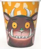 A close-up of a cup featuring a cartoon monster character. Produktbild-Vorschau