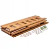 A disassembled wooden garden bench with its hardware laid out. Náhled obrázku produktu