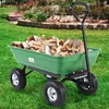 A green garden cart filled with firewood is on a grassy lawn in front of a landscaped garden. Produktbild-Vorschau