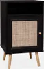 A black bedside table with a rattan door and wooden legs, shown against a white background. Anteprima dell’immagine prodotto