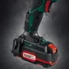 A close-up shot of the battery and handle of a cordless drill. Produktbild-Vorschau