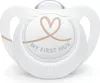 A white NUK baby pacifier with a heart design and text. Produktbild-Vorschau