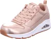 A single Skechers Uno-Metallixs sneaker in rose gold, white, and brown. Voir les images du produit