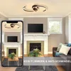 A living room scene featuring a modern ceiling lamp, with a smartphone displaying a similar lamp in the foreground. Náhled obrázku produktu