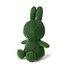 A green Miffy plush toy sitting on a white background. Produktbild-Vorschau