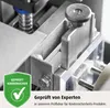 Close-up of a safety mechanism with a green certification badge. Anteprima dell’immagine prodotto