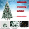 A snow-covered artificial Christmas tree with feature callouts and close-up images of its details. Anteprima dell’immagine prodotto